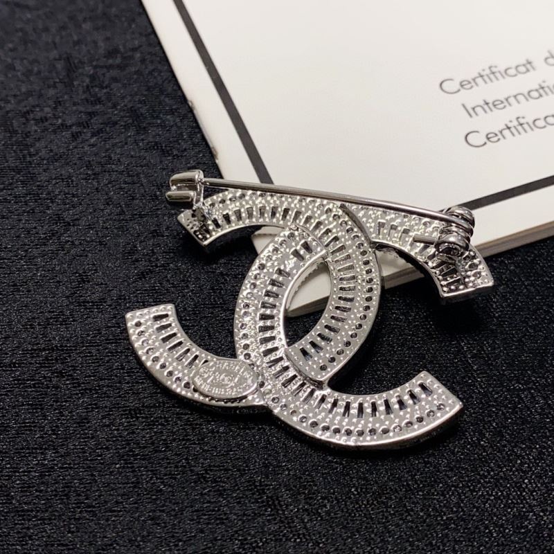 Ch**el brooches